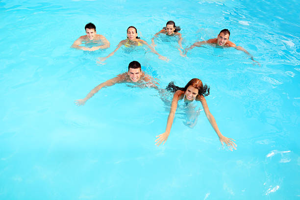 istock Young people swimming in pool. 186825463