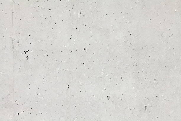 High resolution background of textured beige concrete wall