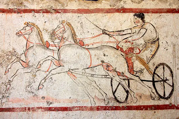 Detail of a painting depicting a chariot with two horses, found in a sarcophagus near Paestum, major Graeco-Roman city in the Campania region of Italy. Other images in: