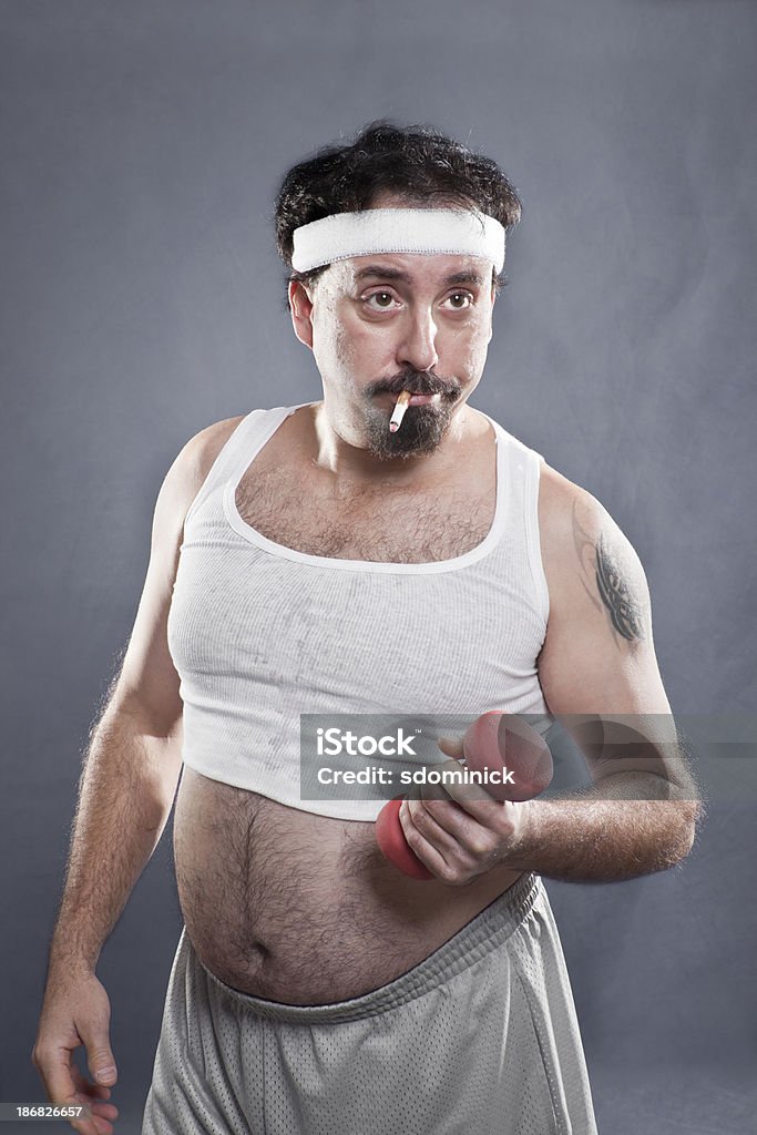 Mann Rauchen und Training - Lizenzfrei Humor Stock-Foto