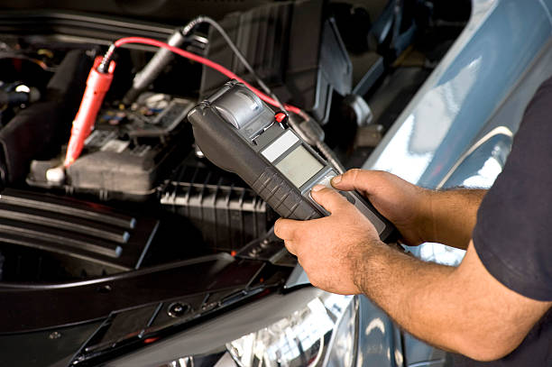 Checking Car Battery  amperage stock pictures, royalty-free photos & images