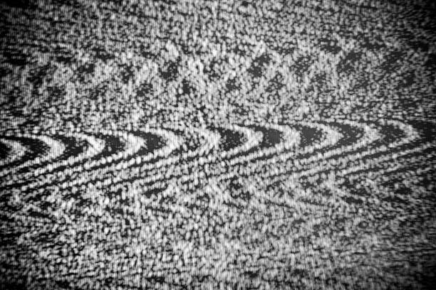 Analog TV Pattern Close-up of analog tv noise display screen fuzzy tv screen stock pictures, royalty-free photos & images