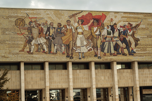 Tirana, Albania - November 29, 2023: A close-up photo of the murals on the exterior wall of the National History Museum in Skanderbeg Square