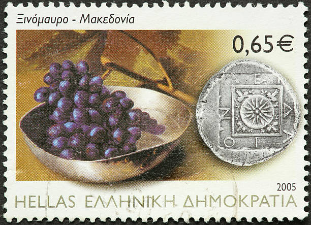istock grapes silver bowl and old coin 186828858