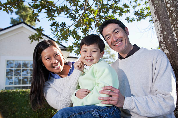 istock Family at home in yard 186829119