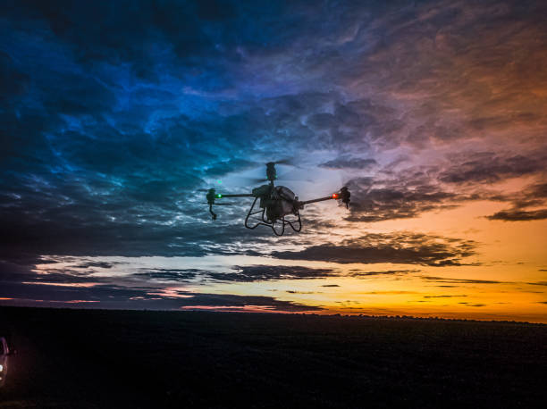 Lucas do Rio Verde, Brazil - December 12, 2023. The The Agricola Drone DJI T40 flying and applying nutrients to soybean crops, in the state of Mato Grosso, Brazil. The agricultural drone is expanding in the Brazilian market, gaining reliability in its efficiency through the comprehensive technology that the equipment offers to rural producers in agribusiness.