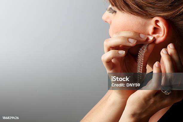 Earring Stock Photo - Download Image Now - Getting Dressed, Earring, Women