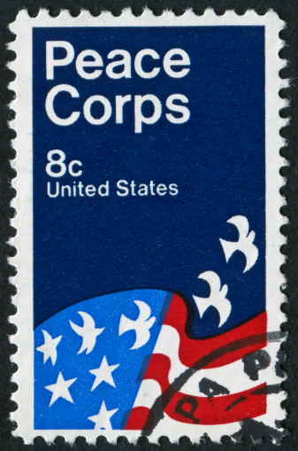 Cancelled Stamp From The United States Commemorating The Peace Corps.
