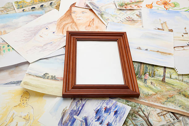 istock blank picture frame with background of watercolour paintings 186830651