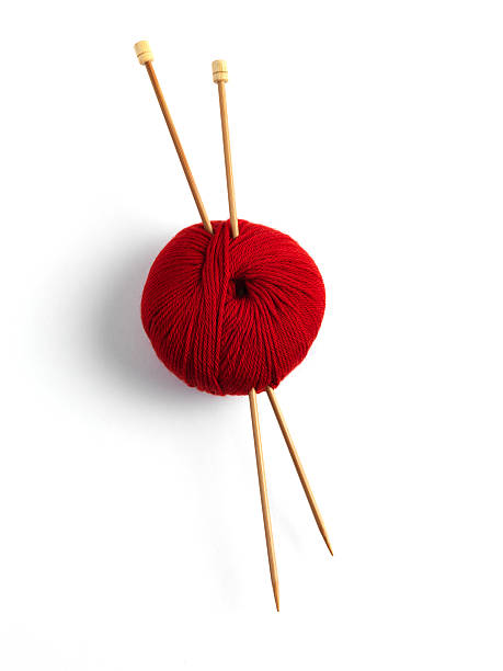 wheres the pattern single red knitting wool with needles knitting needle stock pictures, royalty-free photos & images