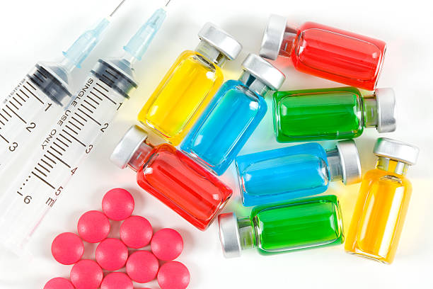 médecine vials - injecting capsule macro pill photos et images de collection