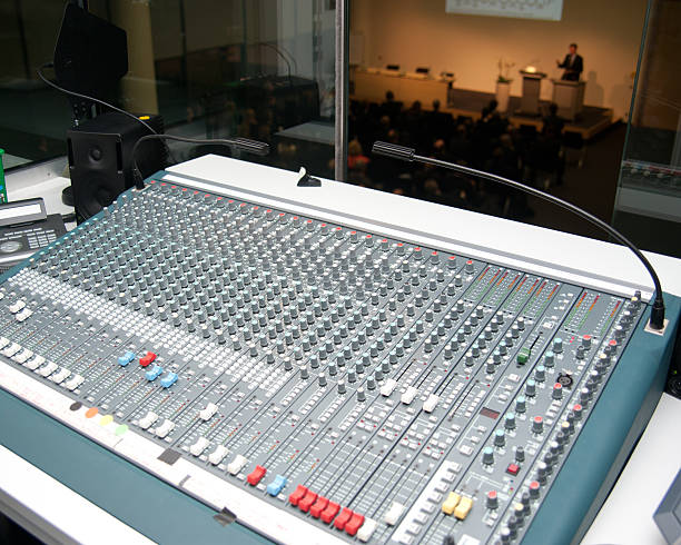 mixing desk - Studiomischpult human hands handling with mixing desk regler stock pictures, royalty-free photos & images