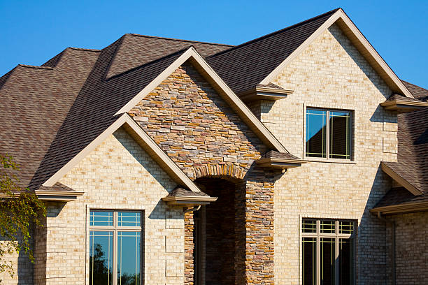 istock Dynamic Brick and Stone Textured Two Story Home 186831879