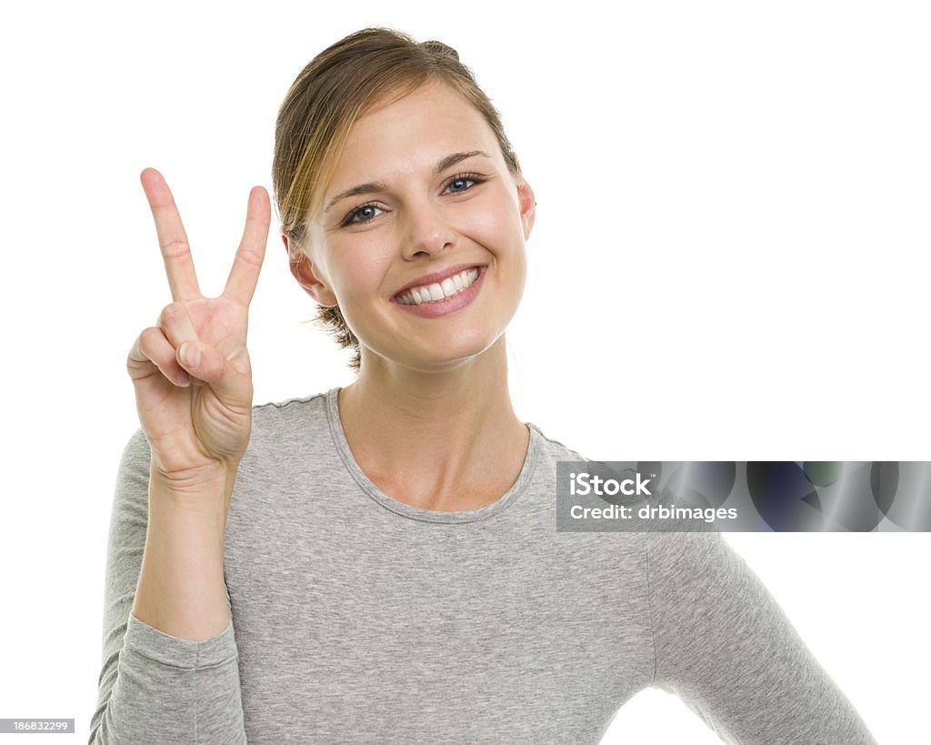 Sorridente Jovem mulher com dois dedos de Sinal de Mão da Paz - Royalty-free Dois Dedos Foto de stock