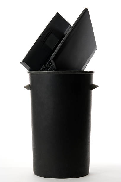 istock Broken laptop in black trash can on white background 186832692
