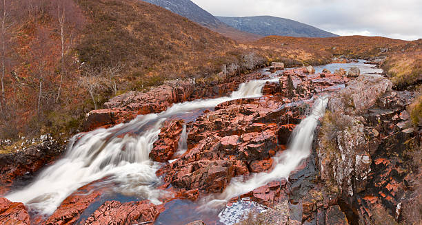 River Etive "Pink granite in the River Etive in Glen Etive, by Glencoe, in winter." etive river photos stock pictures, royalty-free photos & images