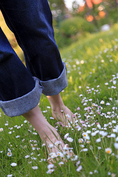 istock Woman walking through a garden 186832977