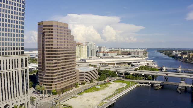 aerial view along hillsborough river of downtown tampa, florida skyscrapers city