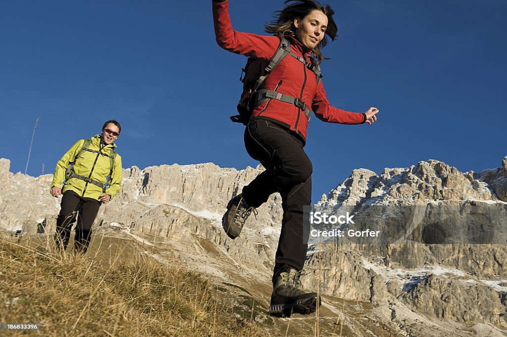 Hiking in nature with fun Hikers jumping with friends in the natureView other images with these models in my portfolio: Friendship Stock Photo