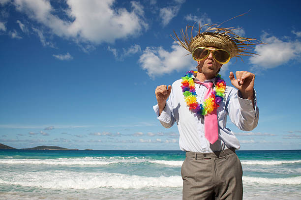 istock Crazy Tourist Man Businessman Dances on Tropical Beach 186833494