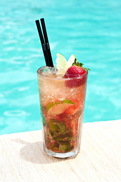 istock Matochito tequila cocktail near waterpool on the mat 186834633
