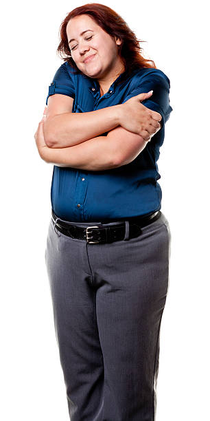 istock Woman Hugs Herself 186834919