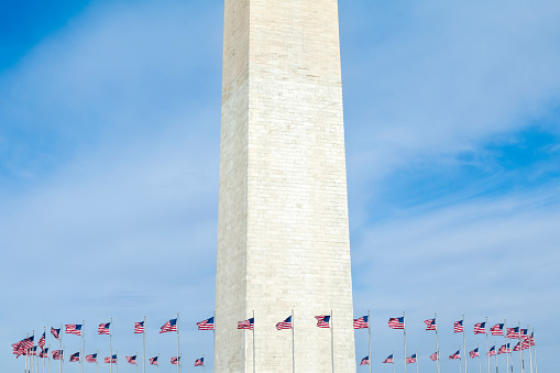 Flags circling the Washington Monument.