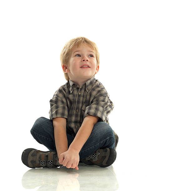 istock cute blond child on a white background 186835150