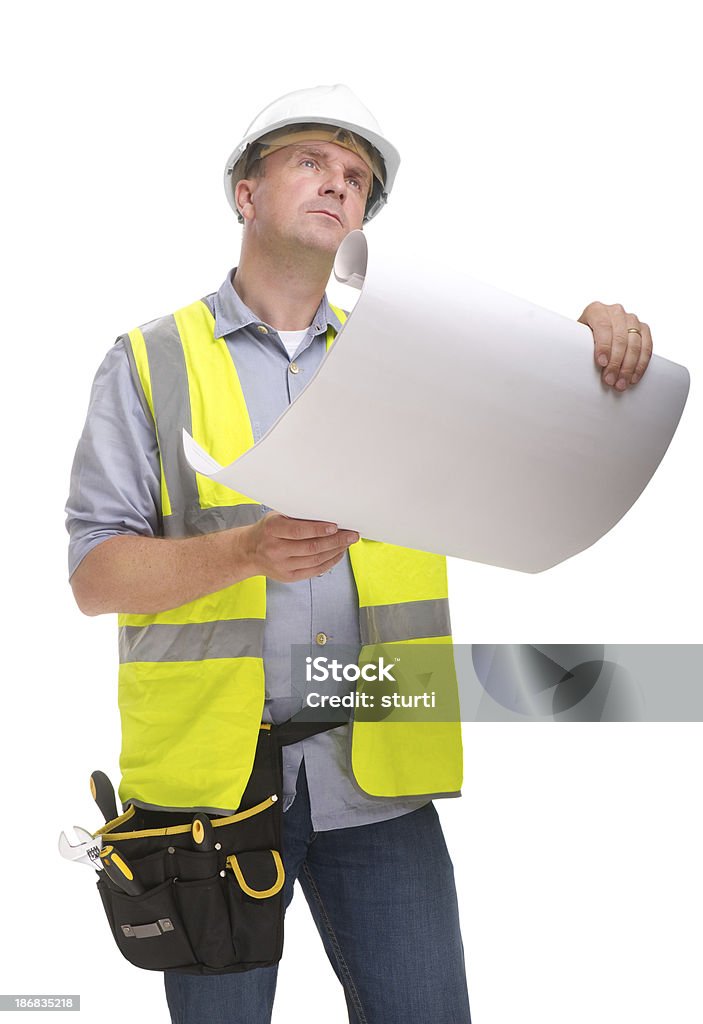 Travailleur de la Construction avec des plans - Photo de Ouvrier du bâtiment libre de droits