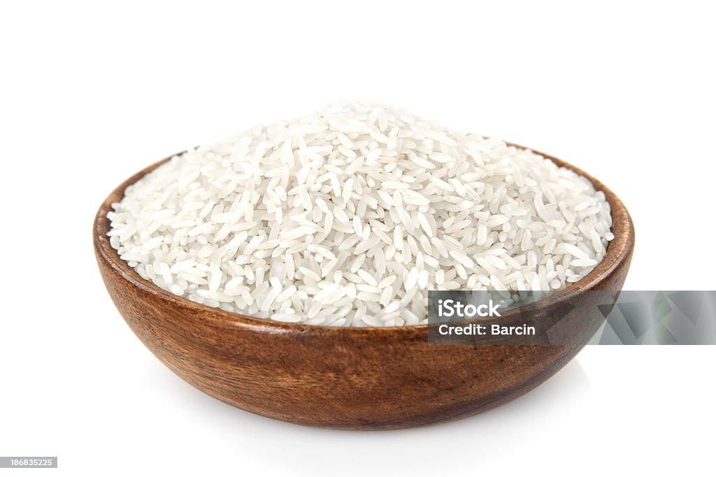 Riz dans un bol en bois - Photo de Riz - Aliment de base libre de droits