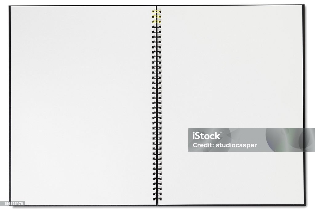 Blank spiral notebook A sketchbook lies open to a blank page. Isolated on white. Sketch Pad Stock Photo