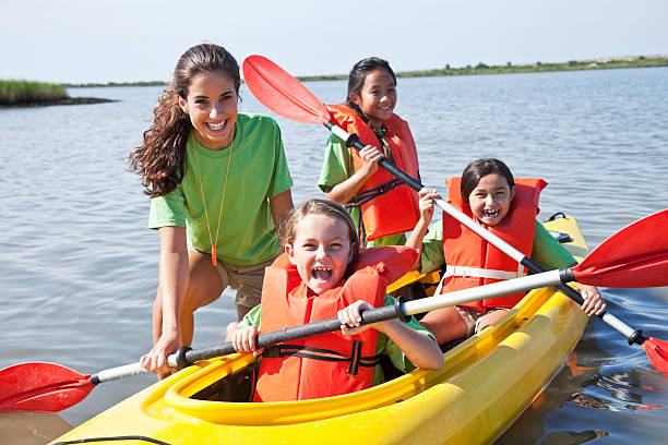 Girls in a double kayak
