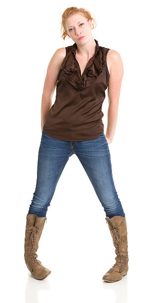 istock Serious Young Woman Standing 186835834