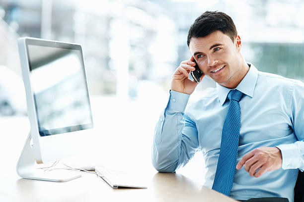 istock Business man talking on mobile phone 186836400