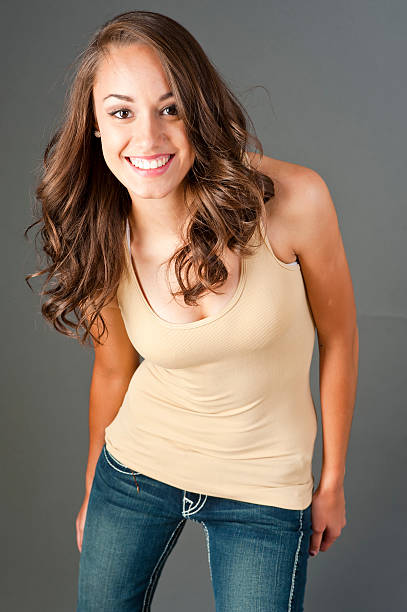 istock Beautiful young woman having fun 186837146