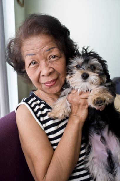 istock Senior and Puppy 186837334