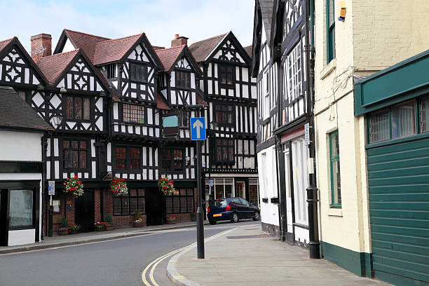 street corner medieval half-timbered buildings street corner medieval half-timbered buildings - ludlow, england ludlow shropshire stock pictures, royalty-free photos & images