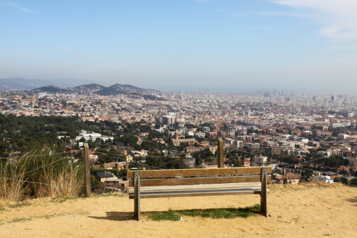 The view of Barcelona from the mountain Serra de Collserola. At the background is the hill El Carmel the district - Horta-Guinardo.