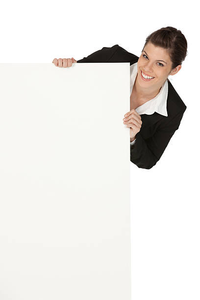 istock Businesswoman smiling behind a placard 186838689