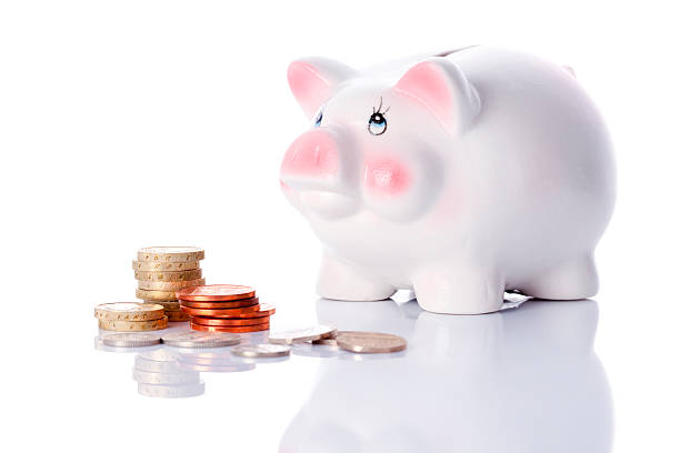 istock Blushing Piggy Bank With Coins 186838981