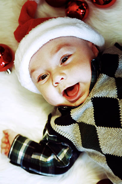 istock Baby Boy Excited About Christmas 186839547