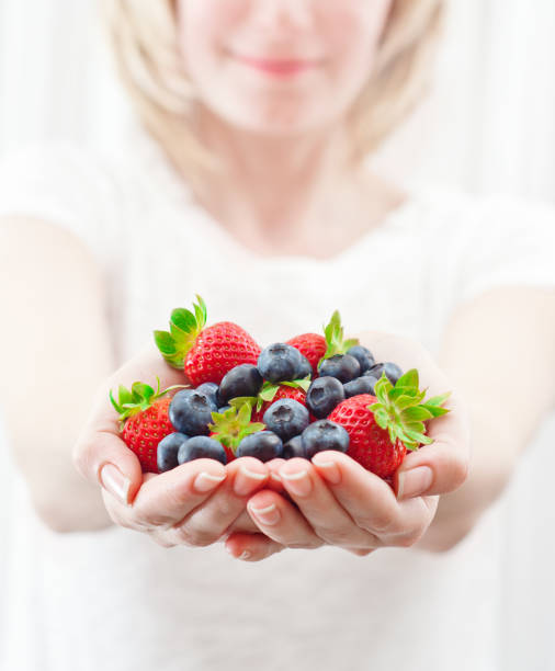 istock Handful of fresh fruits 186840296