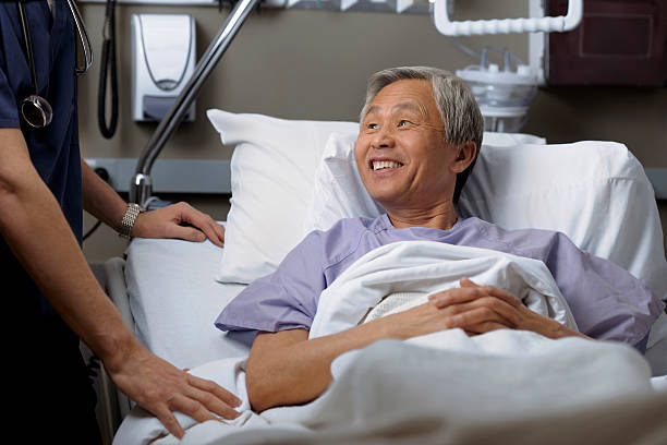 istock Mature male asian patient in the hospital 186840607
