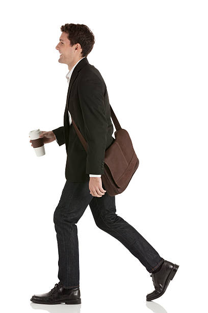 istock Happy businessman walking with coffee 186840660