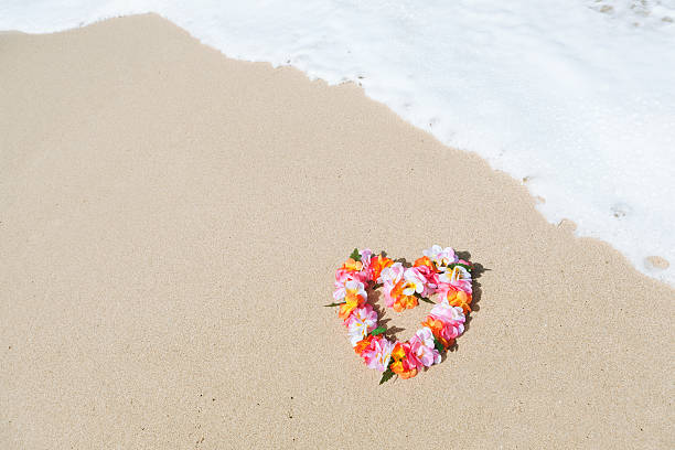 istock Hawaiian Lei on the Tropical Paradise Beach 186840666