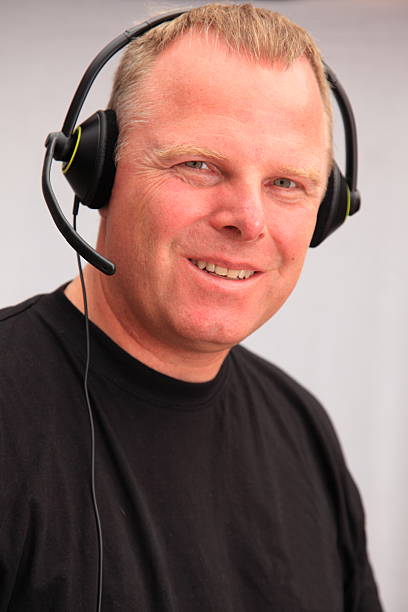 istock Mature male customer service representative smiling 186840695