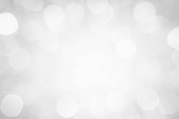 istock Blurred silver sparkles and defocused christmas lights 186841099