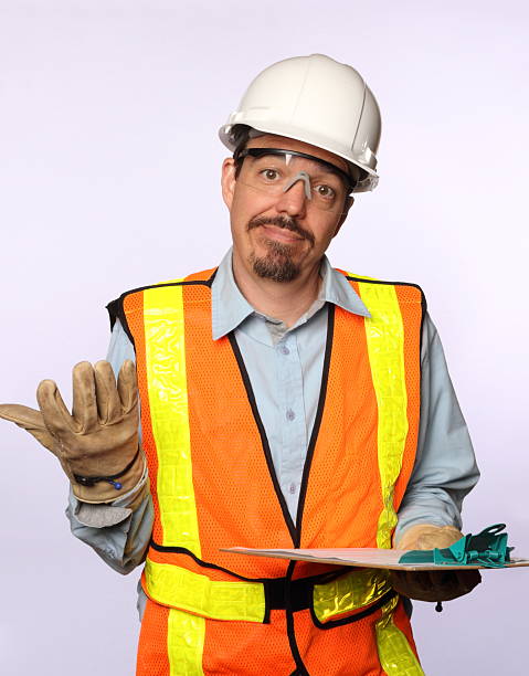 istock Building Inspector With Clipboard Shrugs 186841448