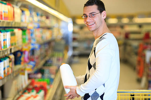 istock Man Holding Juice Grocery Shopping 186841452