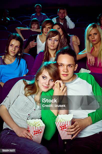 Date In Movie Theater Stock Photo - Download Image Now - Movie Theater, Couple - Relationship, Embracing